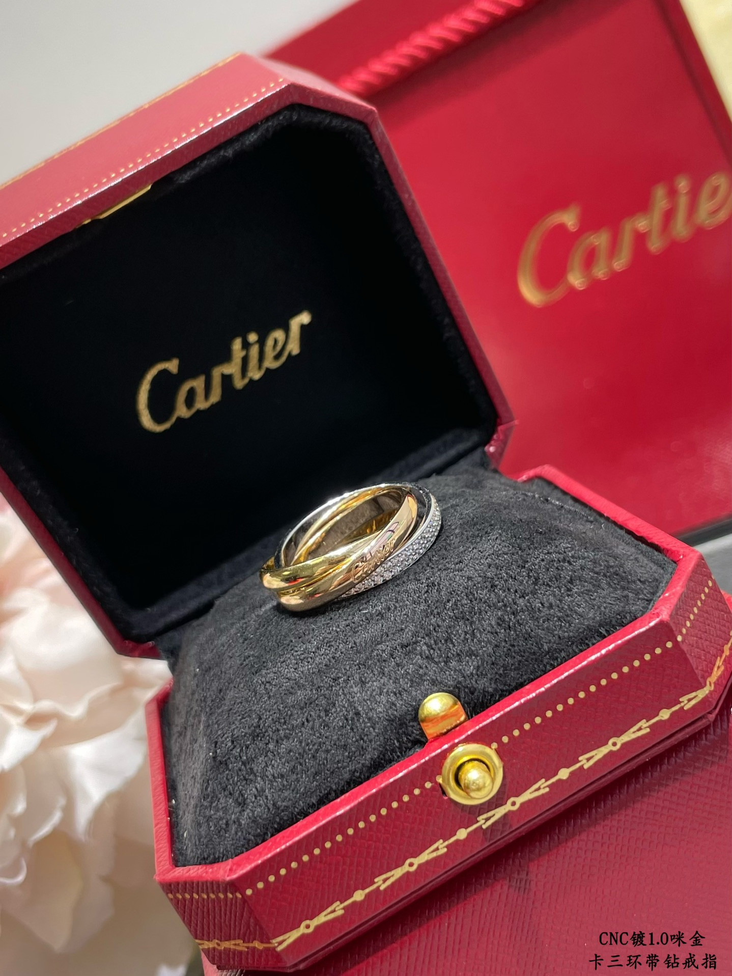 Ca*t*er three-band diamond ring