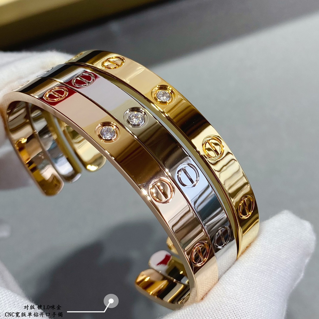 Ca*t*er wide single diamond open LOVE Bracelet