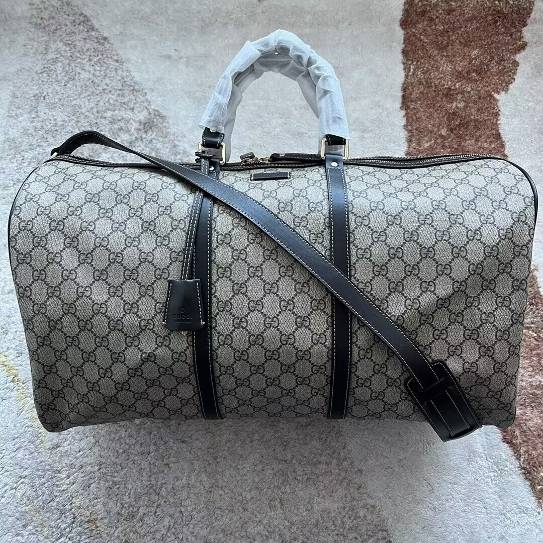 G*u*i Keepall Bag