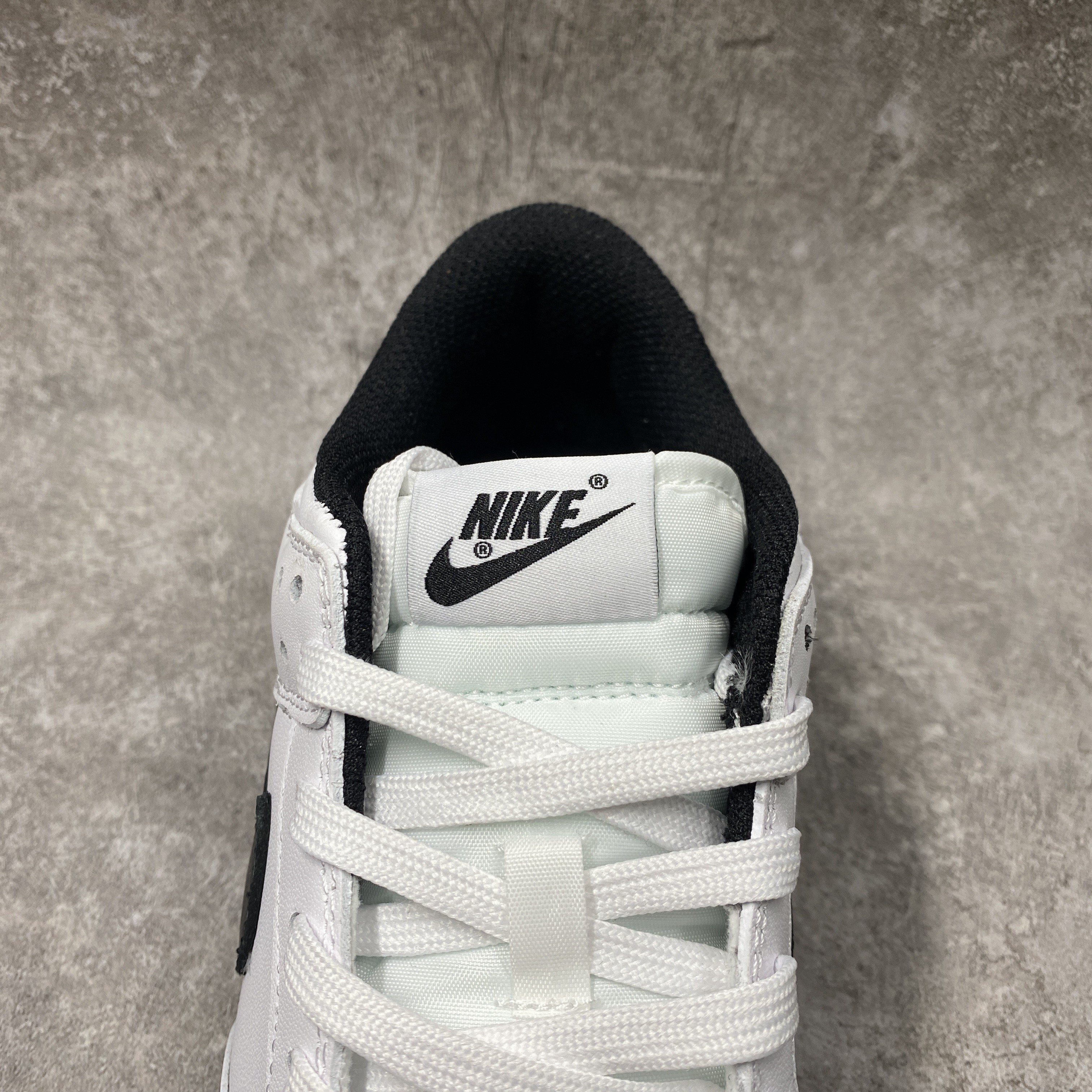 nike dunk low surF**es in clean white and black